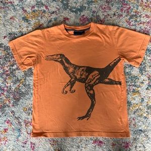 Mini-Boden Orange Dino T-Shirt. Size 7-8